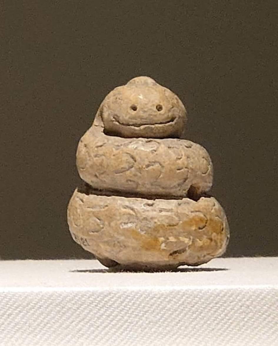 Happy snek sculpture, Thailand, 6th-11th century AD