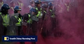 Clashes erupt in UK city over racially charged case of handcuffed dying student | AFP