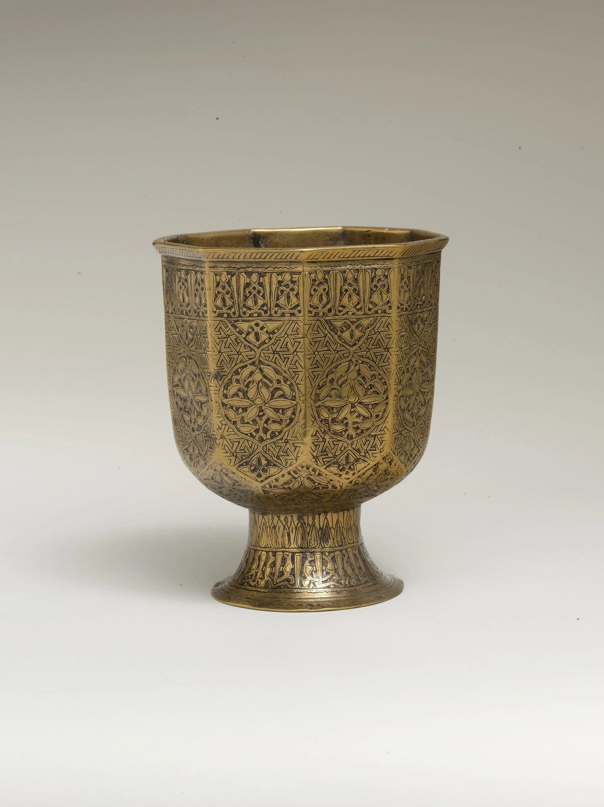 Beautifully engraved brass cup, Iran, late 14th century AD