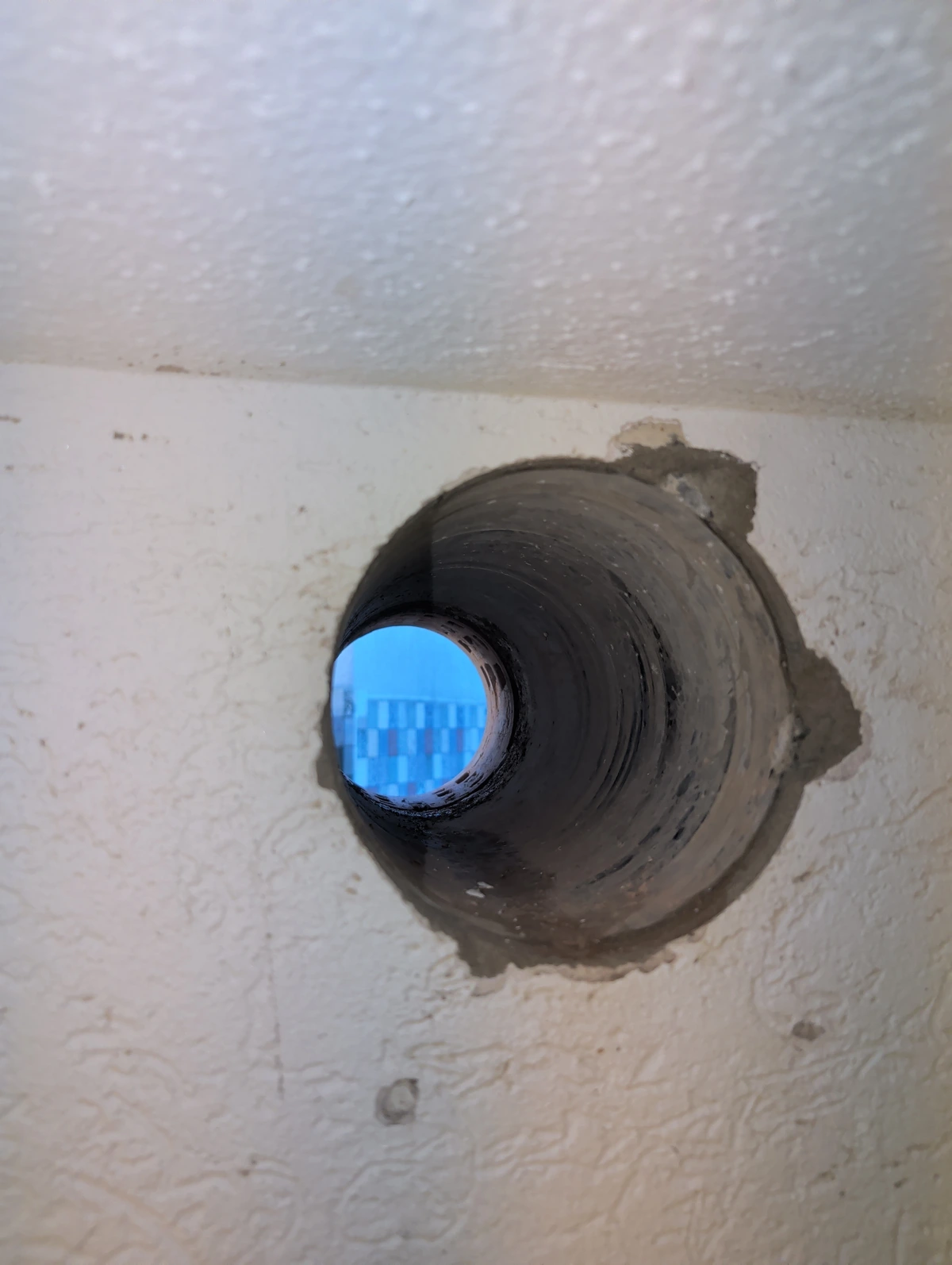 I drilled a hole through an old bank vault.