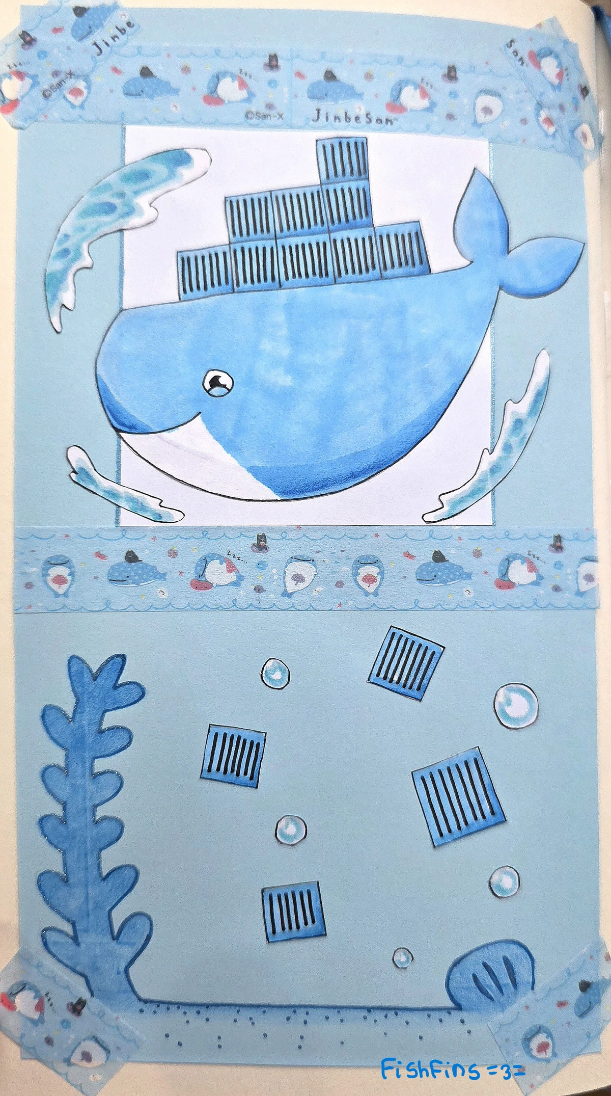 A drawing of the docker whale smiling, with square containers on its back. The whale is positioned on a white square on the top section of a blue sheet of paper. Docker is surrounded by three splashes of water. There is a line of blue Jinbesan washi tape on the top and bottom of the white paper, and also a little bit crossing the corners of the whole page. On the bottom part of the page, we can see a blue plant and shell outlined in a sparkly gel pen. There are also blue square containers and bubbles floating around.