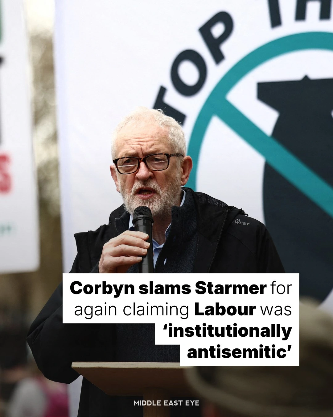 Photo of Jeremy Corbyn speaking while holding a microphone, with text reading:

Corbyn slams Starmer for
again claiming Labour was
‘institutionally antisemitic’ 

Below, text reads Middle East Eye
