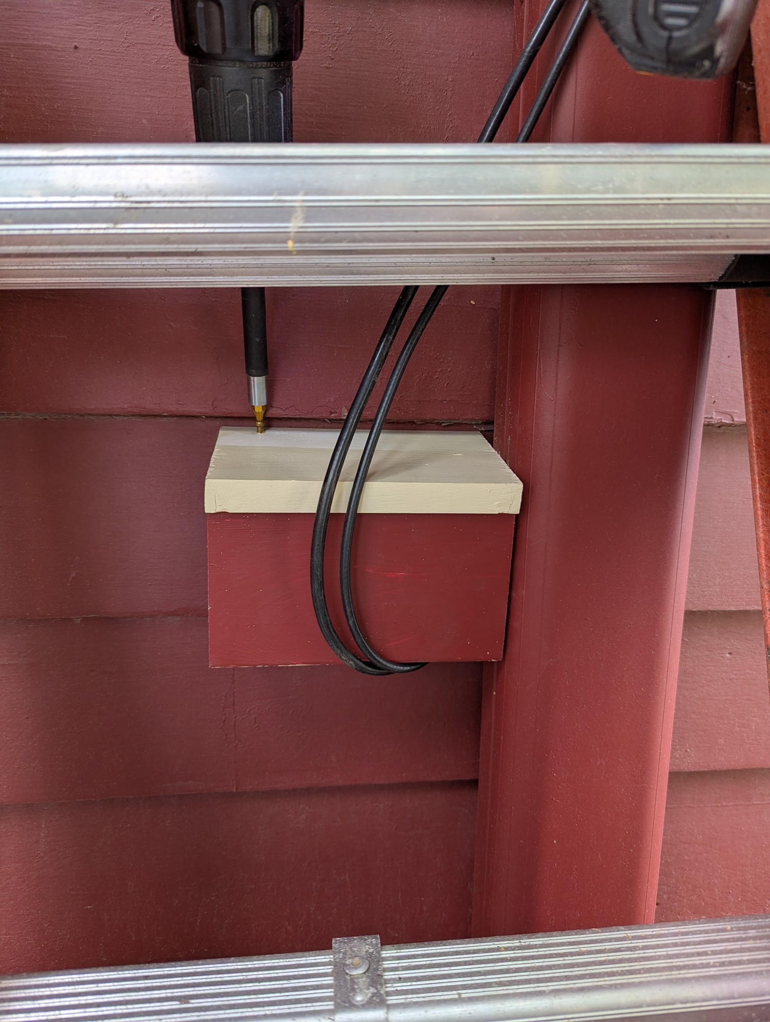 behind the ladder