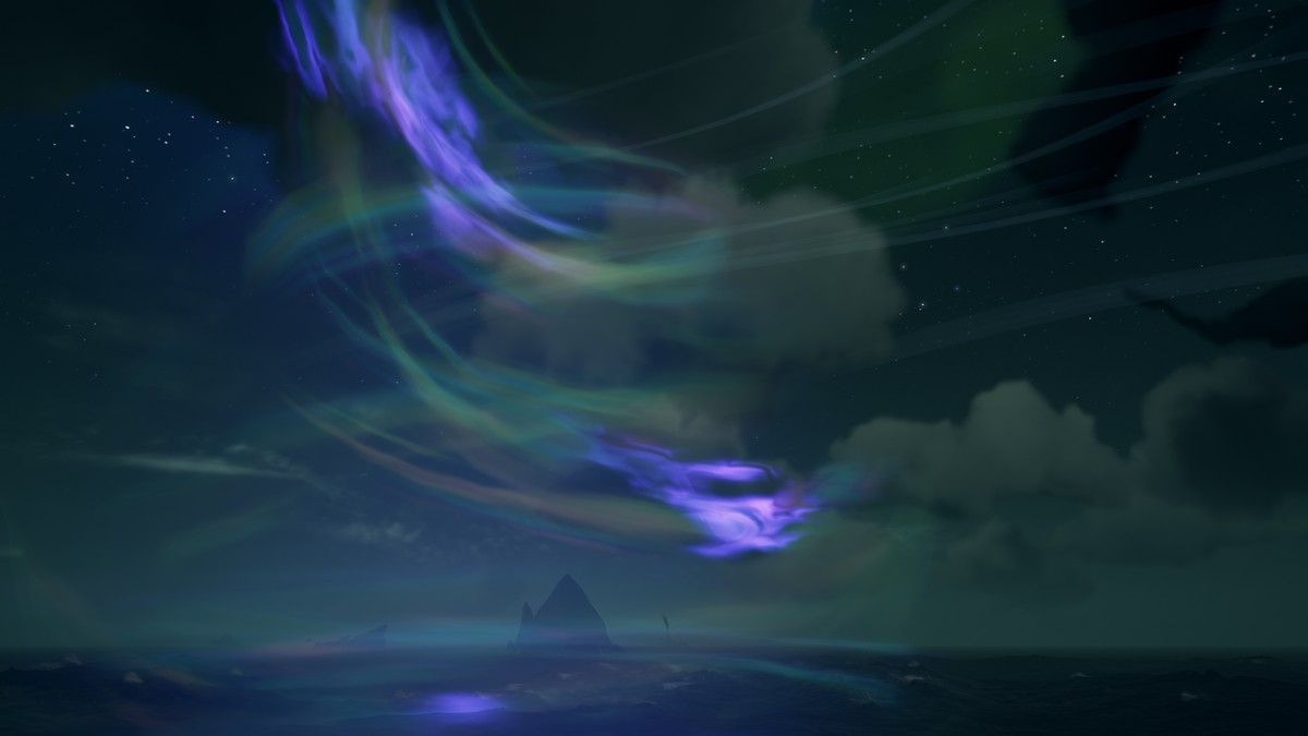Un tourbillon de lumières, bleu, verte et violette, s'élève de l'océan vers un ciel nocturne.