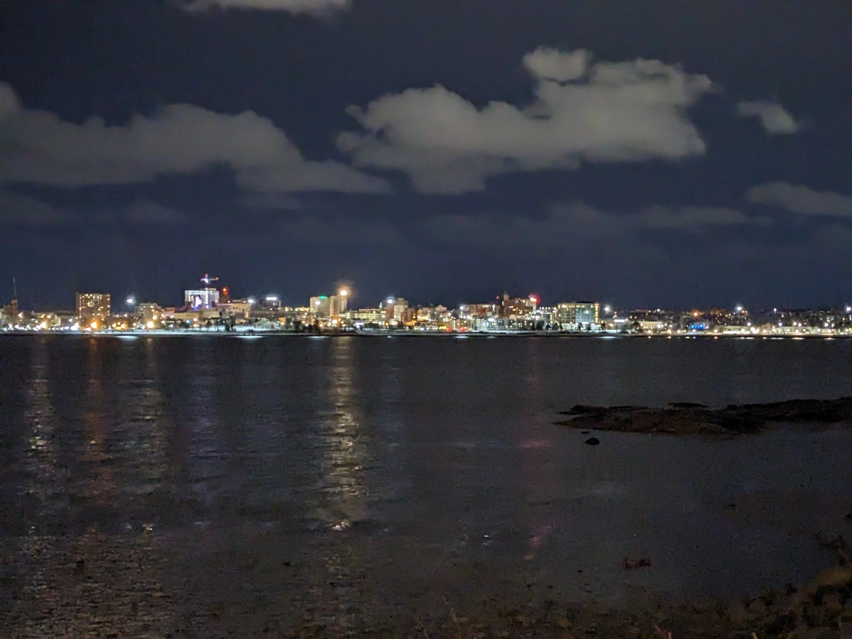 A photo of the Portland skyline at night, from across the bay