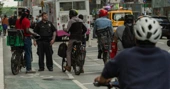 Drivers Who Run Red Lights Get Tickets. E-Bike Riders Get Court Dates.