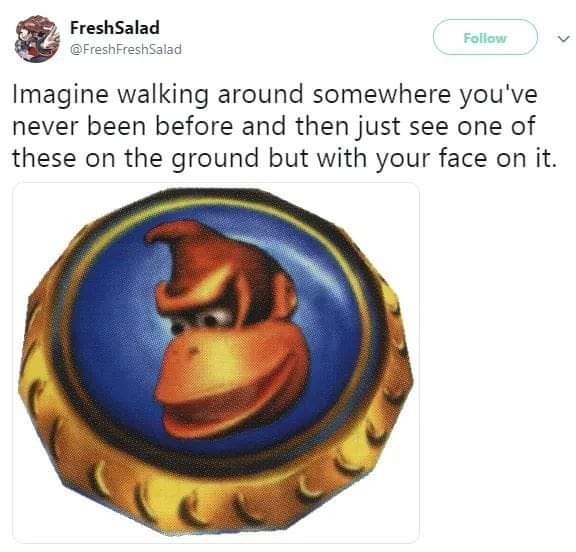 tweet. "imagine walking around somewhere you've never been before and then just see one of these on the ground but with your face on it." image of a donkey kong token from DK64