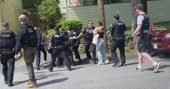 "Unruly" crowd tries to stop ICE agents from detaining woman in Massachusetts, 2 arrested