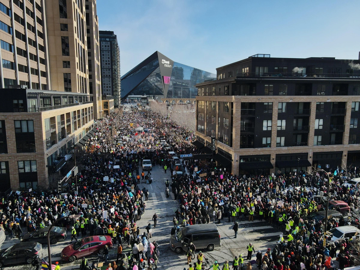Aerial photo of a large crowd of people protesting as far as the eye can see