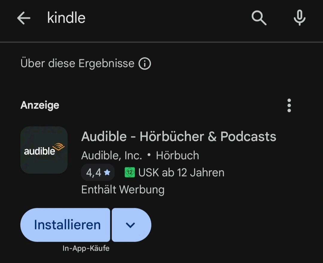 Suchergebnisse für die E-Book App "Kindle" im Android Play Store. Das oberste Werbe-Ergebnis ist die verwandte App "Audible" für Audio-Bücher.