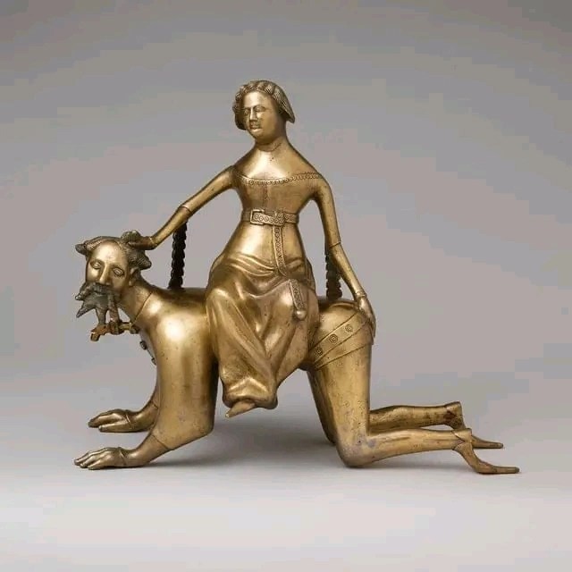 Water vessel depicting the Greek philosopher Aristotle being ridden by the seductress Phyllis, object made in the Netherlands, 14th-15th century AD
