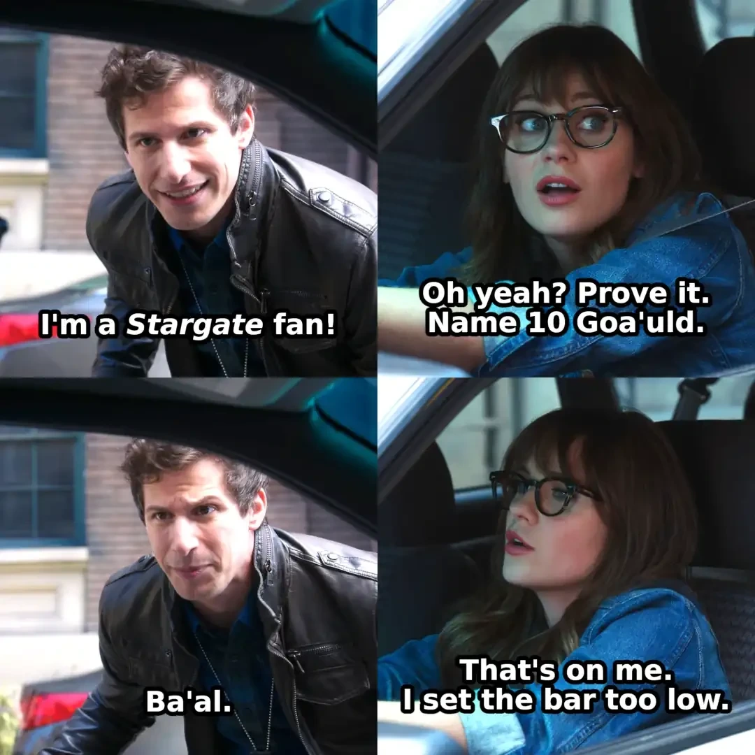 Panel 1: Jake saying "I'm a Stargate fan!" Panel 2: Jess saying "Oh yeah? Prove it. Name 10 Goa'uld." Panel 3: "Ba'al." Panel 4: "That's on me. I set the bar too low."