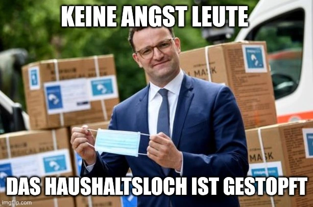 Jens Spahn hält eine Maske in der Hand, Text: Keine Angst Leute das Haushaltsloch ist gestopft