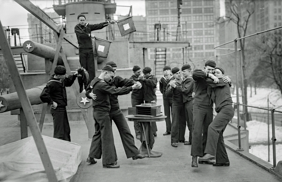 Sailors dancing on a fake battleship built for recruiting/fundraising purposes in New York City, USA, WW1, 1917