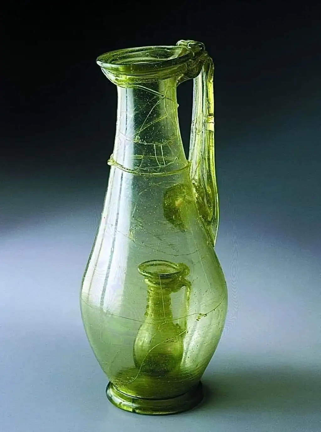 Roman novelty jar, glass, 4th century AD