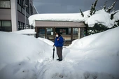 Japan warns of avalanches as snow deaths rise to 35