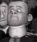 incredibles movie screenshot of mr stansweet in neck brace headshot