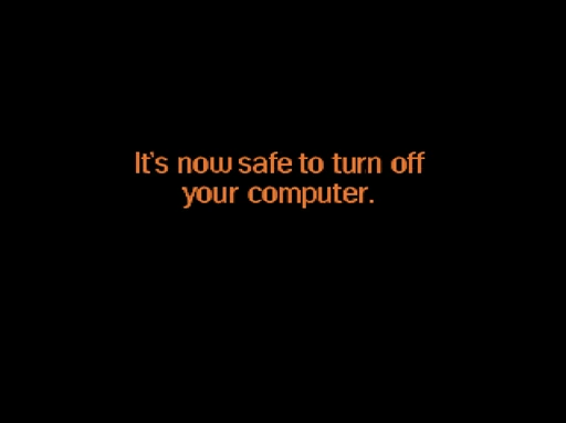 orange text on a black background: It's now safe to turn off your computer.