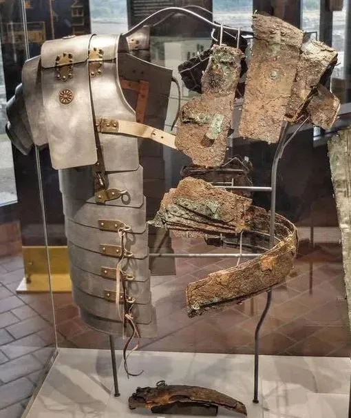 Rare fragments of Roman Lorica Segmentata armor, and reconstruction of what it would have looked like whole, ~1st-2nd century AD