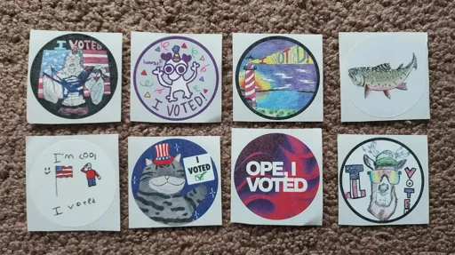 "I Voted" stickers: werewolf, party creature, lighthouse, flag salute, "OPE", and deer with cool glasses.