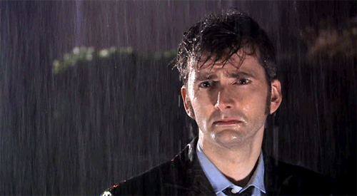 sad man in rain gif