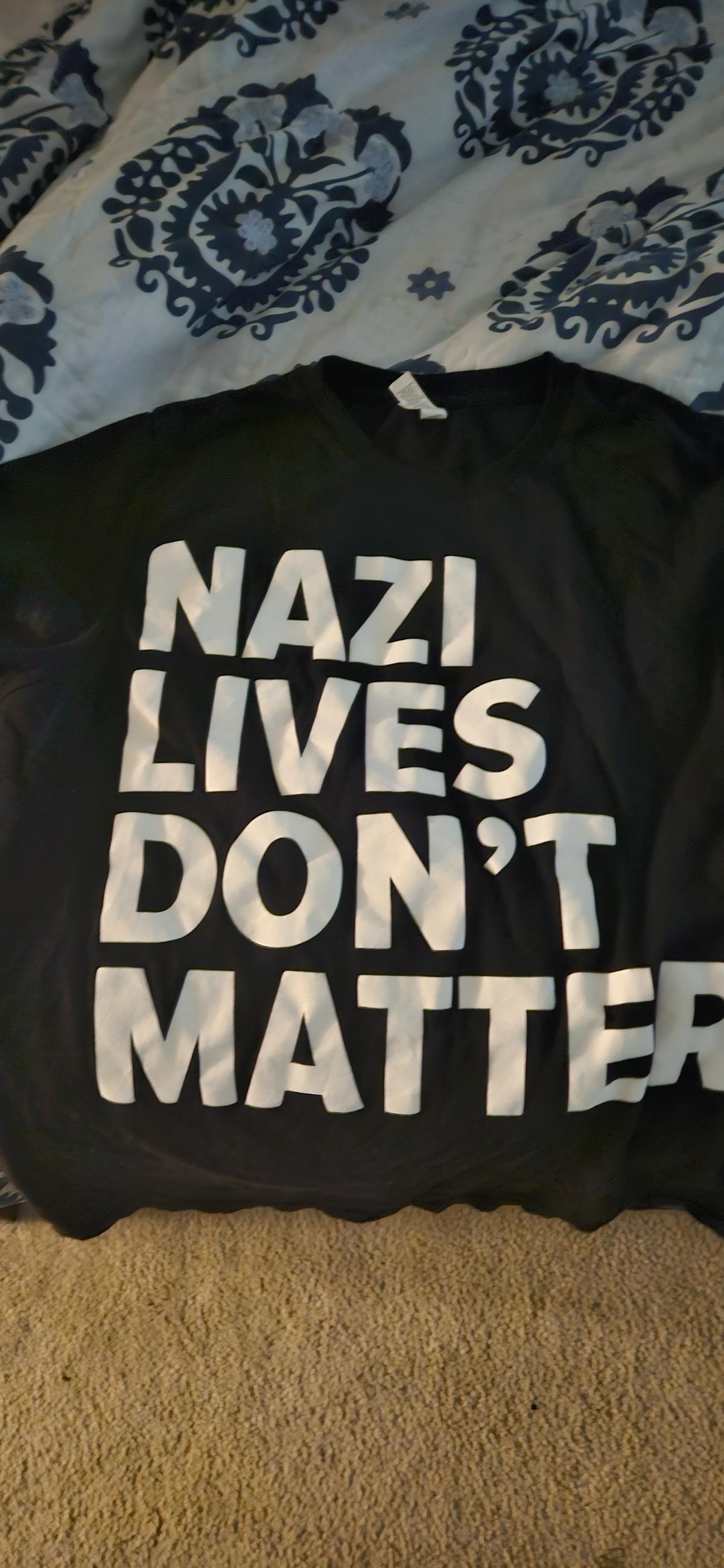 Balck t-shirt with white text: "NAZI LIVES DON'T MATTER"