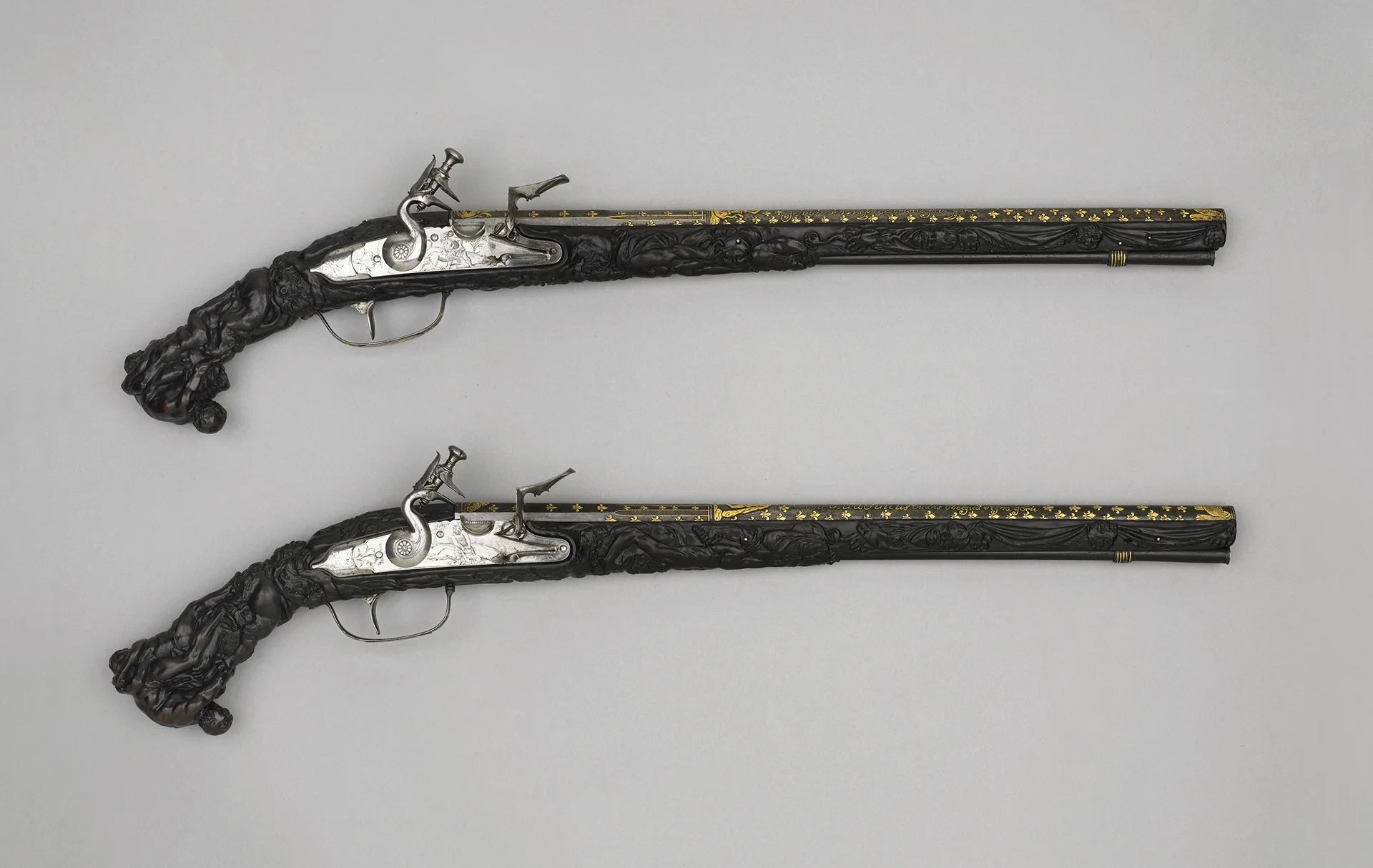 Elaborate flintlock pistols made for King Louis XIV of France, ~1660 AD